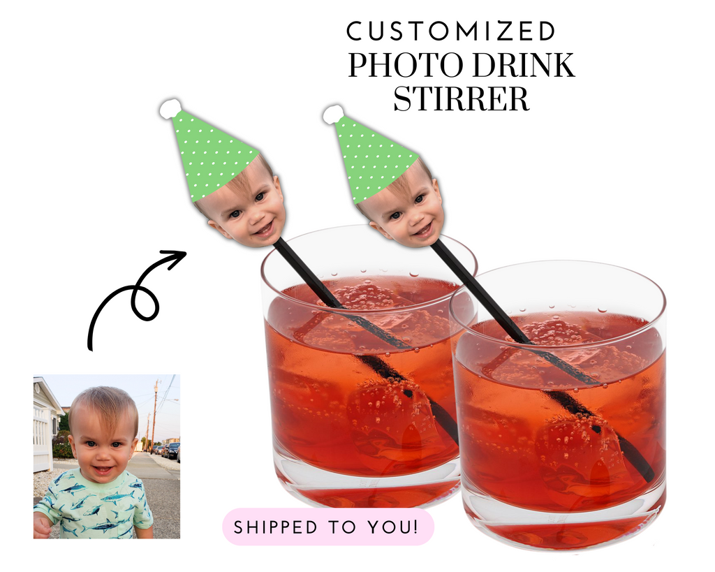 Custom photo cocktail stirrers with green and white party hat on top.