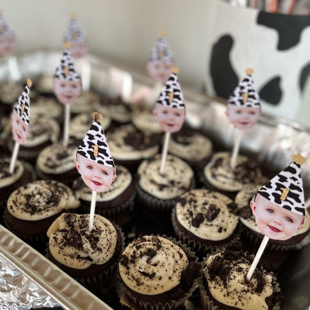 Photo cupcake toppers with cow print party hat on top