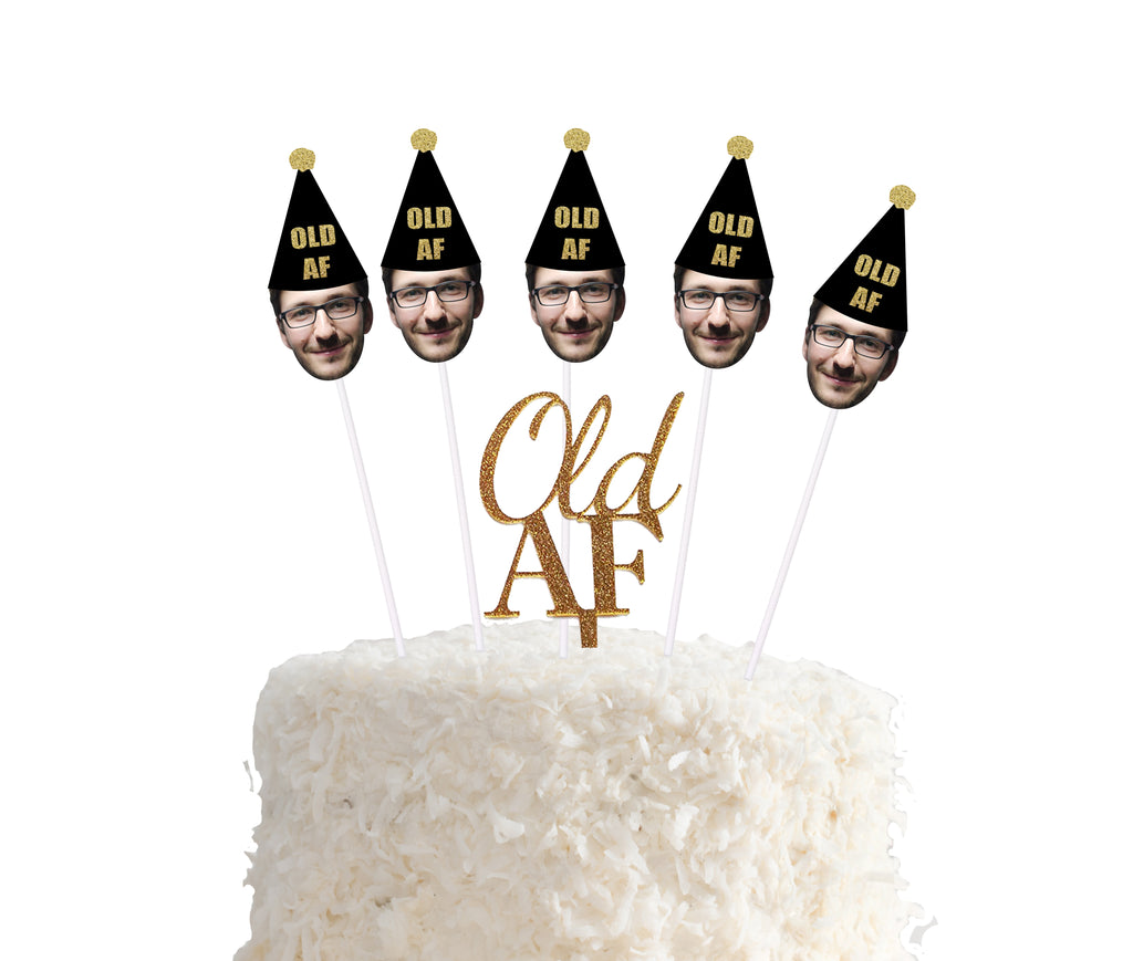 Old AF gold cake topper with face