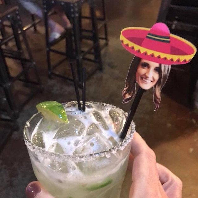 Pink sombrero drink stirrers with facec