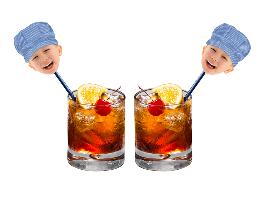 Train themed drink stirrers with face and conductor hat